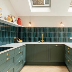 Green tiles in shaker kitchen